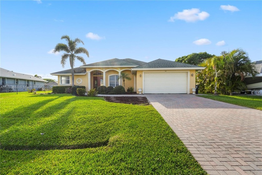 Discover this stunning 3 BD | 2 BA waterfront home with no HOA! - Beach Home for sale in Port Saint Lucie, Florida on Beachhouse.com