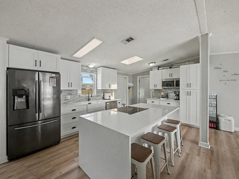 Move-in ready, newly remodeled 4-bedroom, 2-bath manufactured - Beach Home for sale in Boca Raton, Florida on Beachhouse.com