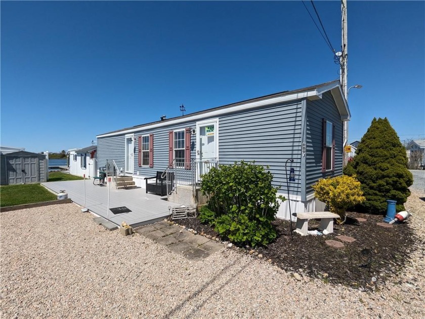 Charming and turnkey 2 bed / 1.5 bath mobile home in the Village - Beach Home for sale in South Kingston, Rhode Island on Beachhouse.com