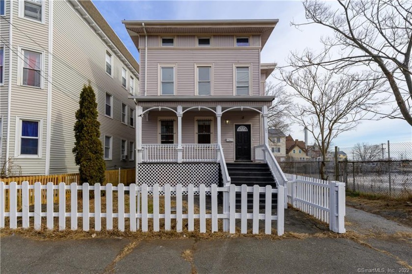 This fully renovated multi-family home is located next to the - Beach Home for sale in Bridgeport, Connecticut on Beachhouse.com