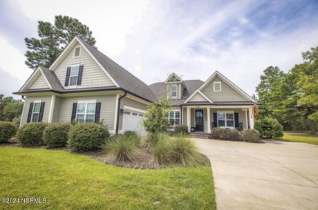 Here is THE ONE. This home has a spacious split floor plan - Beach Home for sale in Leland, North Carolina on Beachhouse.com