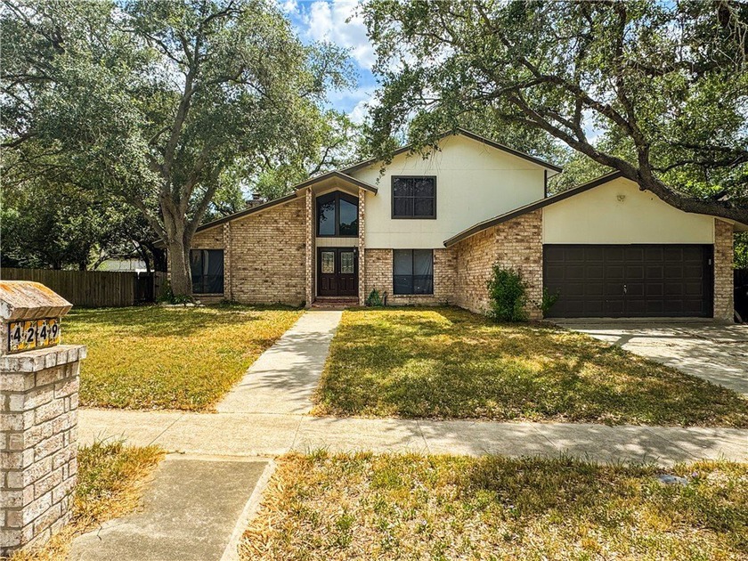 Welcome to this spacious 4-bedroom, 2-bathroom two-story home - Beach Home for sale in Corpus Christi, Texas on Beachhouse.com