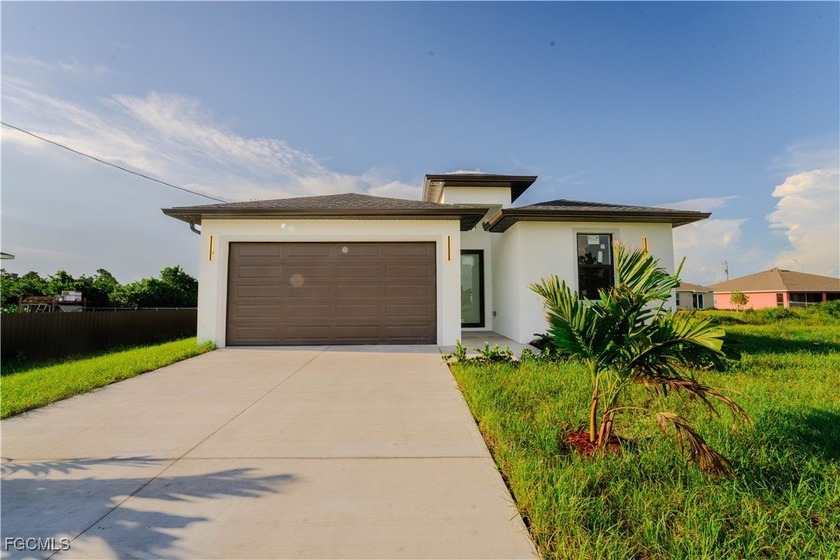 Don't miss this brand-new construction home located just minutes - Beach Home for sale in Lehigh Acres, Florida on Beachhouse.com