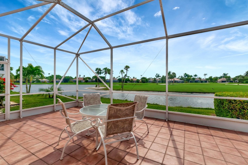 THIS WATER FRONT HOME OVERLOOKS THE 4TH HOLE OF ABERDEEN GOLF - Beach Home for sale in Boynton Beach, Florida on Beachhouse.com