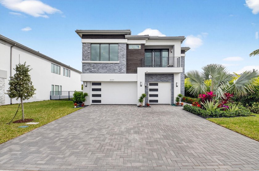 This is a true one-of-a-kind lakefront estate positioned on a - Beach Home for sale in Boca Raton, Florida on Beachhouse.com