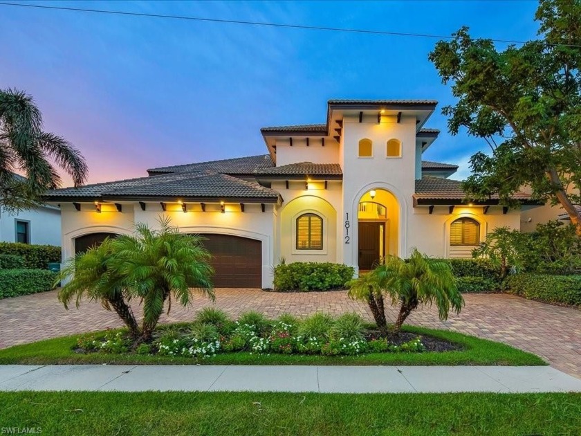Experience the pinnacle of coastal luxury at 1812 Maywood Ct, a - Beach Home for sale in Marco Island, Florida on Beachhouse.com