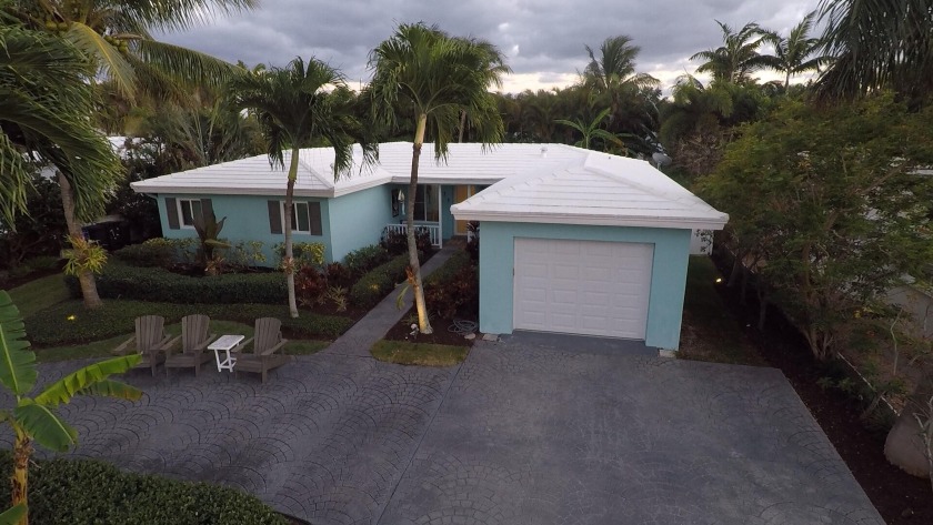 Newly renovated island retreat.  Upgrades include: tankless - Beach Home for sale in Palm Beach Shores, Florida on Beachhouse.com