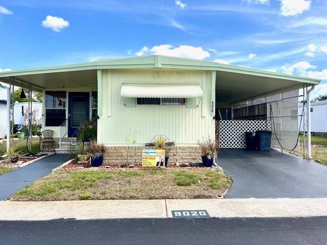 Welcome home to this charming two-bedroom, two-bath sanctuary - Beach Home for sale in Port Richey, Florida on Beachhouse.com