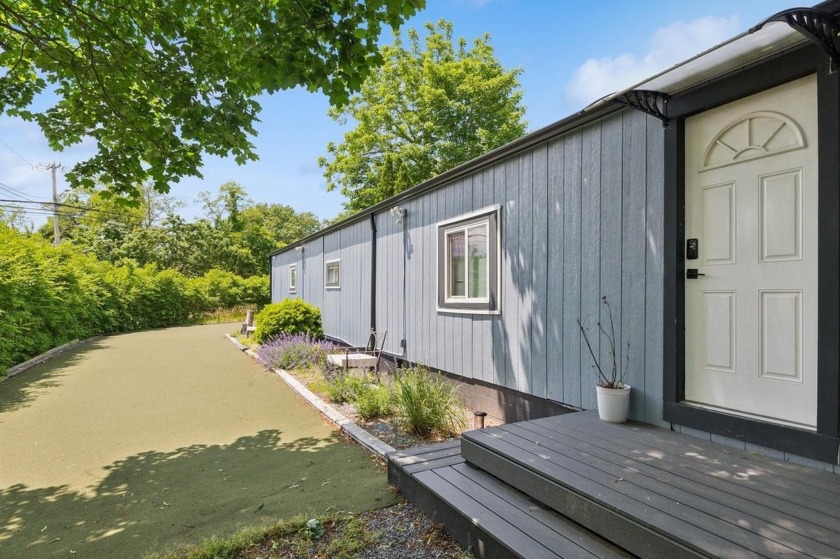 This charming  2-bedroom, 2-bathroom ranch-style home has been - Beach Home for sale in Jamesport, New York on Beachhouse.com