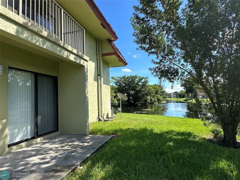 This fantastic 2-bedroom, 2-bathroom first-floor corner with - Beach Condo for sale in Coral Springs, Florida on Beachhouse.com