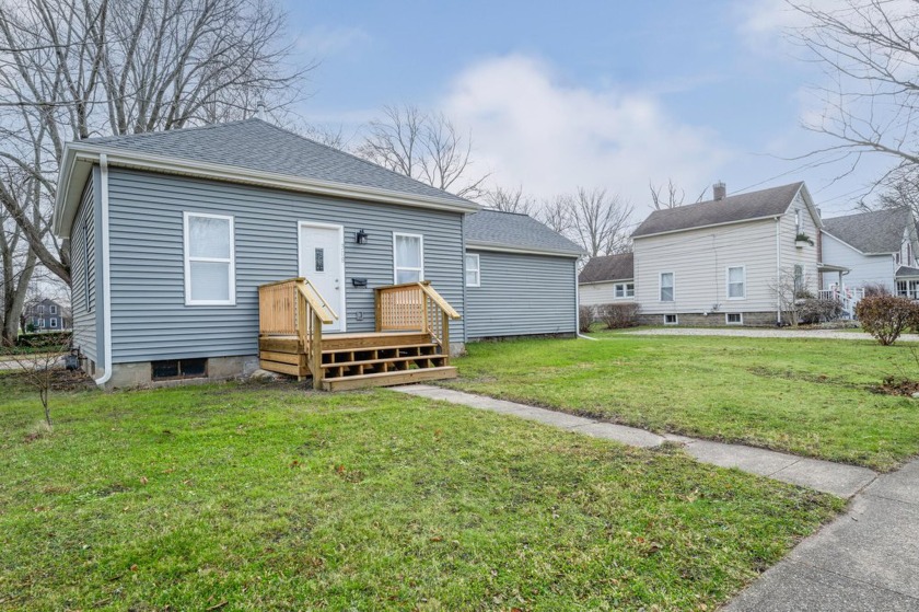 This charming, like-new home is located just one block from - Beach Home for sale in Three Oaks, Michigan on Beachhouse.com