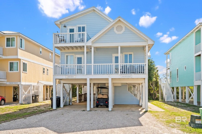 INVESTMENT ALERT! This charming raised beach style home offers - Beach Home for sale in Gulf Shores, Alabama on Beachhouse.com