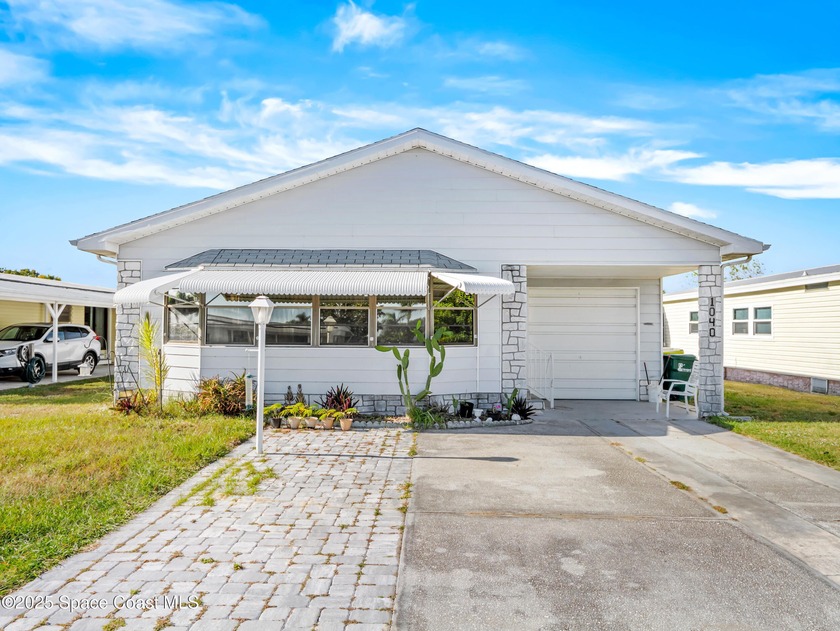 Welcome to your dream home in Barefoot Bay! This spacious - Beach Home for sale in Barefoot Bay, Florida on Beachhouse.com