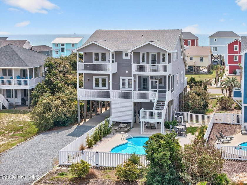 $155,000 PROJECTED ANNUAL RENTAL INCOME -- this is not just a - Beach Home for sale in Oak Island, North Carolina on Beachhouse.com