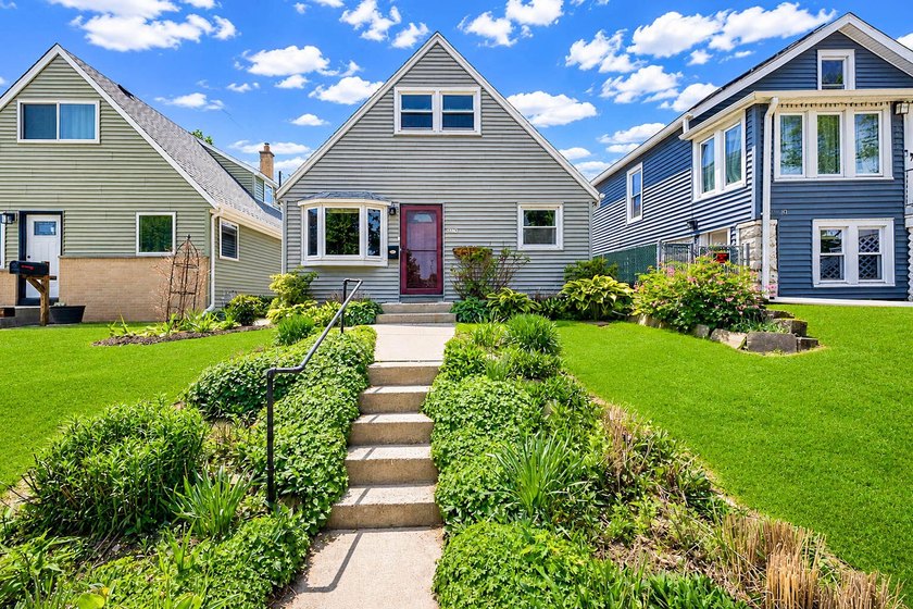 Your storybook dreams have just come true with this impeccably - Beach Home for sale in Cudahy, Wisconsin on Beachhouse.com