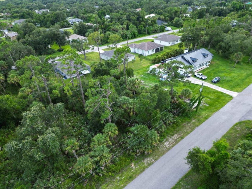 This vacant lot is tucked away in North Port, yet it's just - Beach Lot for sale in North Port, Florida on Beachhouse.com