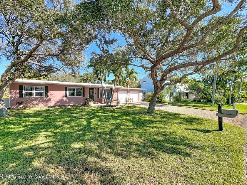 Just five-minutes stroll to the famous Cocoa Beach, this - Beach Home for sale in Cocoa Beach, Florida on Beachhouse.com