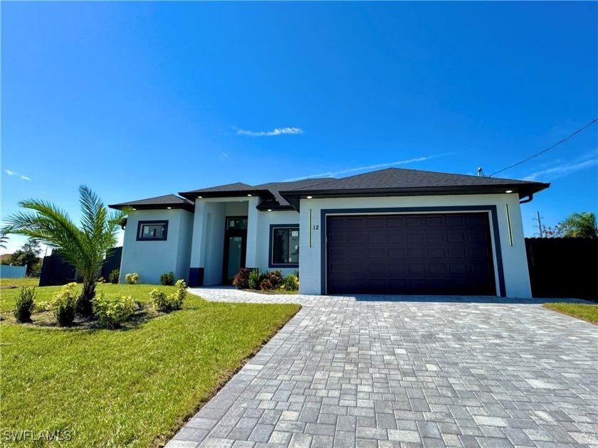 Welcome to 12 SE 17th Ave, an exquisite waterfront residence - Beach Home for sale in Cape Coral, Florida on Beachhouse.com