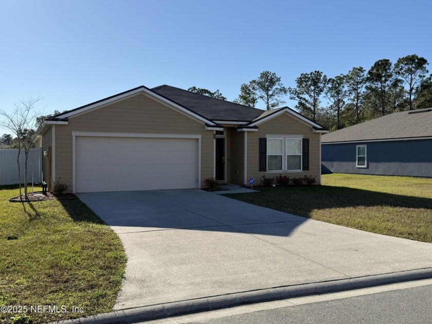 Discover this inviting 4-bedroom, 2-bathroom home that perfectly - Beach Home for sale in Jacksonville, Florida on Beachhouse.com