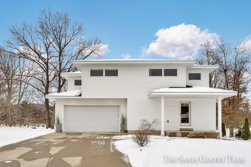 Experience modern sophistication in this custom-built - Beach Home for sale in Norton Shores, Michigan on Beachhouse.com