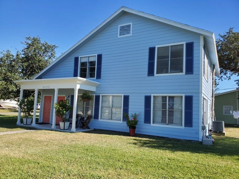 Rare water view triplex investment property that blends - Beach Home for sale in Rockport, Texas on Beachhouse.com