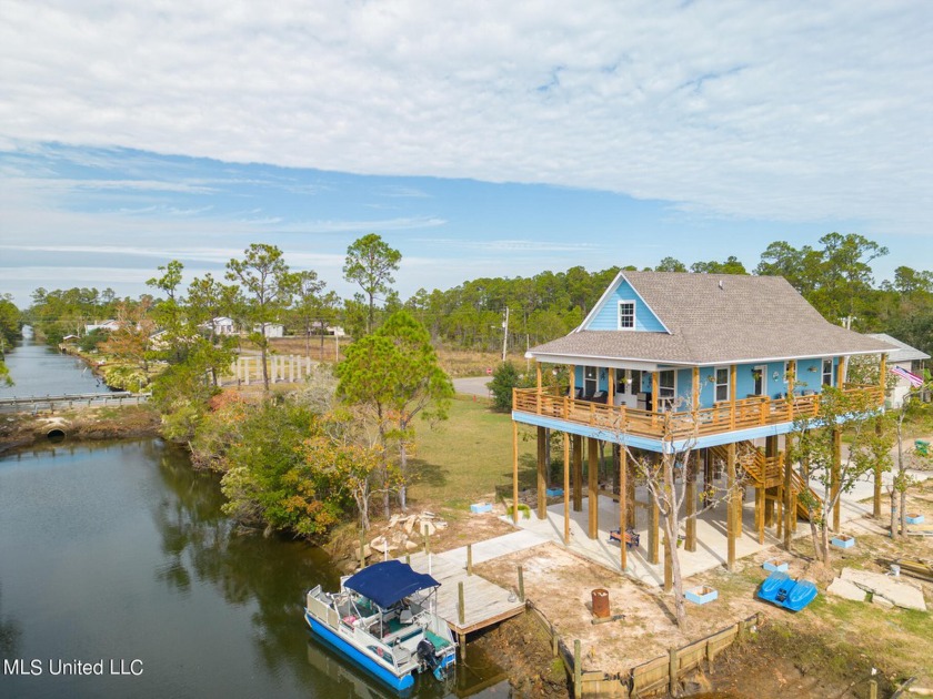 34K under appraised value!!!! Waterfront living with dock and - Beach Home for sale in Bay Saint Louis, Mississippi on Beachhouse.com
