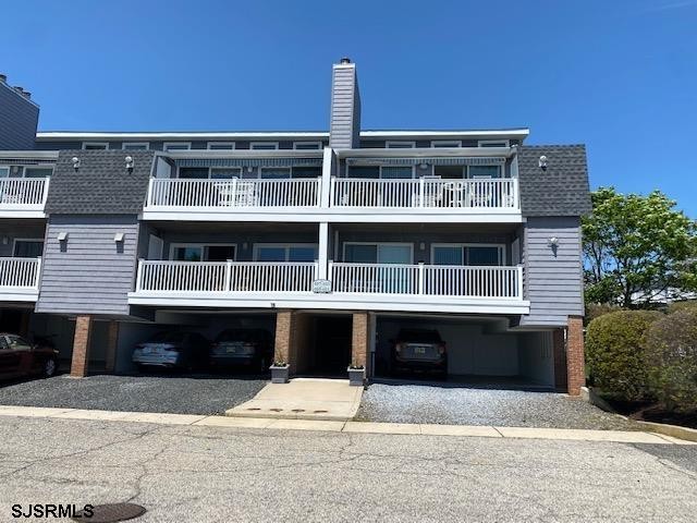 Sit on the front porch with your cocktail and watch the boats go - Beach Condo for sale in Ocean City, New Jersey on Beachhouse.com