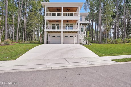 Welcome in to this designer, showcase, Michael Christian Home - Beach Home for sale in Wilmington, North Carolina on Beachhouse.com