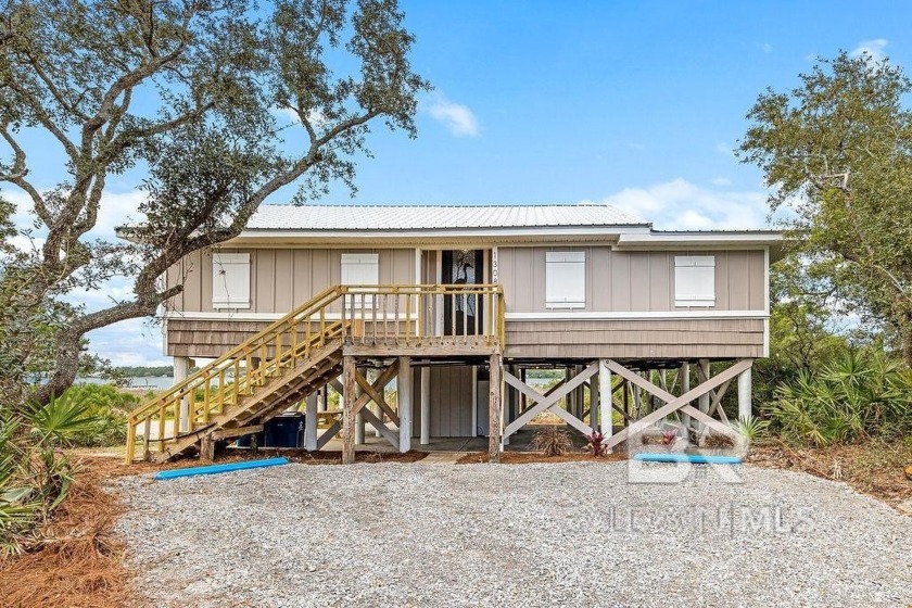 Enjoy the best of both worlds! Very private home sitting on - Beach Home for sale in Gulf Shores, Alabama on Beachhouse.com