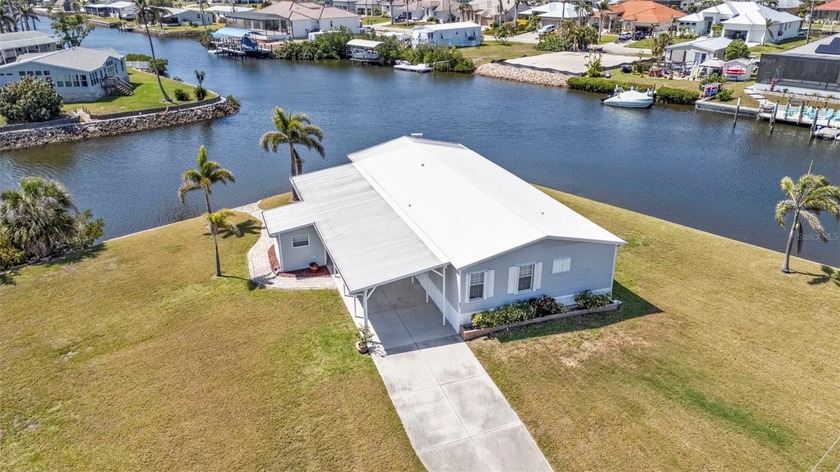 Welcome to your waterfront oasis--featuring an impressive 226 - Beach Home for sale in Punta Gorda, Florida on Beachhouse.com