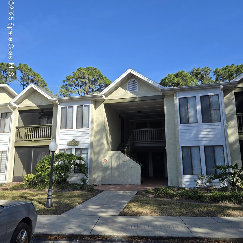 Move in ready! Beautiful 2 bedroom 2 bath unit located upstairs - Beach Condo for sale in Titusville, Florida on Beachhouse.com