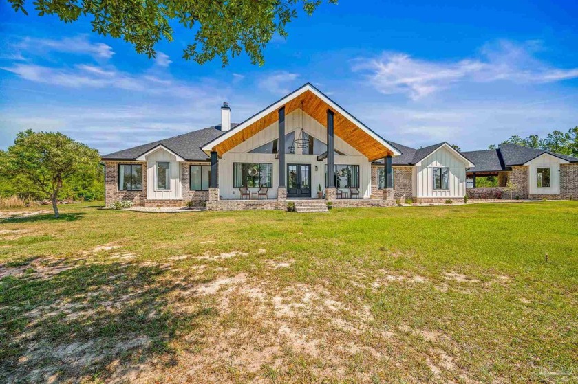 Welcome to this luxurious 6-acre estate in the heart of - Beach Home for sale in Pace, Florida on Beachhouse.com