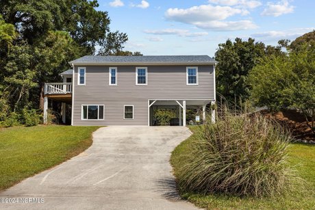 Discover this recently renovated 3-bedroom, 2-bath single-family - Beach Home for sale in Emerald Isle, North Carolina on Beachhouse.com