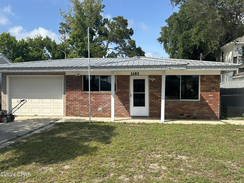 All brick Beach cottage three blocks from the beach. Tile floors - Beach Home for sale in Panama City, Florida on Beachhouse.com