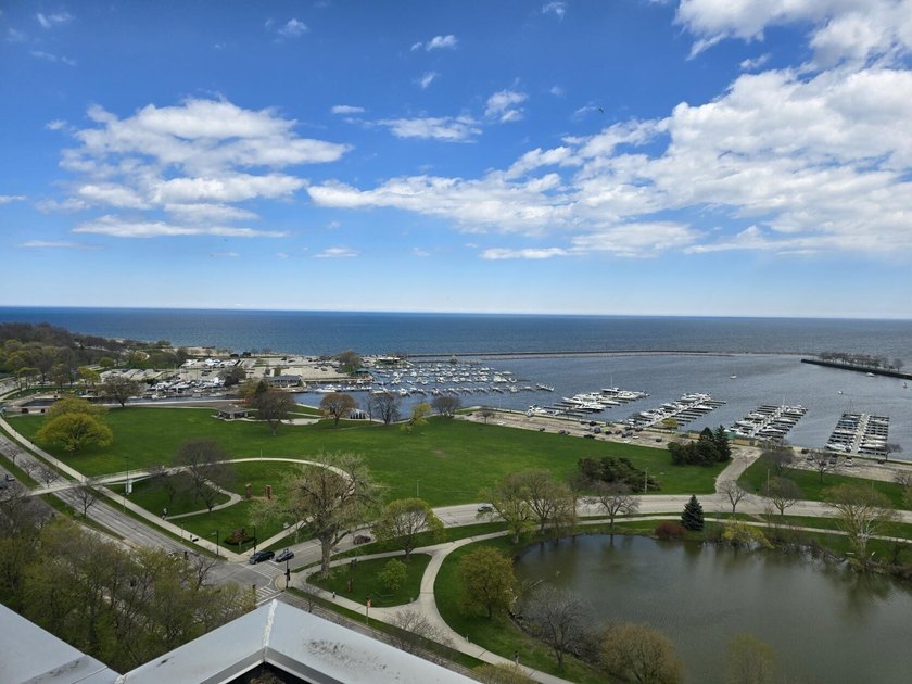 Enjoy a million-dollar view for a fraction of the price in this - Beach Condo for sale in Milwaukee, Wisconsin on Beachhouse.com