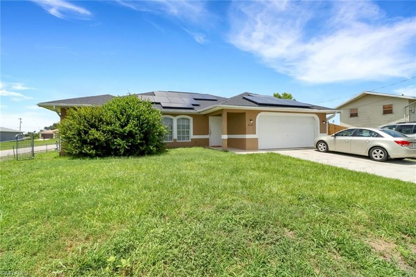 This property truly stands out with its desirable CORNER LOT - Beach Home for sale in Lehigh Acres, Florida on Beachhouse.com