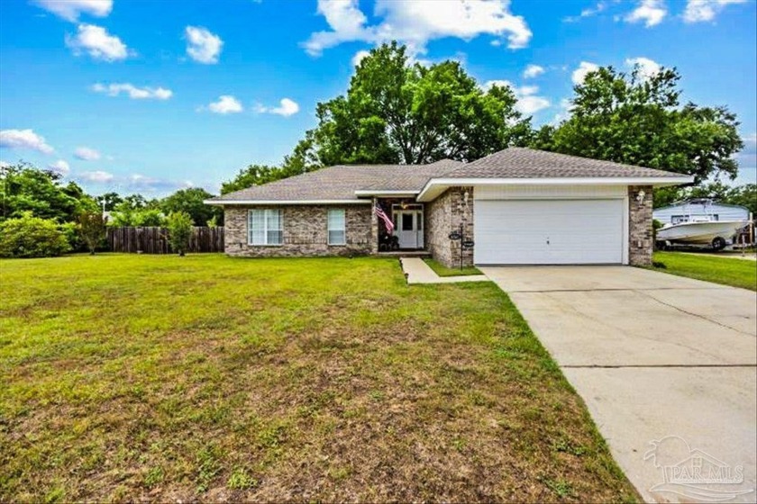 THIS SPACIOUS AND AFFORDABLE 4 BEDROOM 2 BATHROOM HOME WITH - Beach Home for sale in Pace, Florida on Beachhouse.com