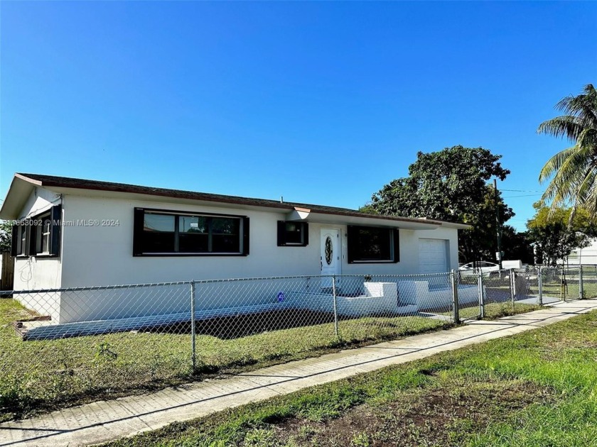 Welcome to this charming 2-bedroom, 2-bathroom home nestled in - Beach Home for sale in North Miami Beach, Florida on Beachhouse.com