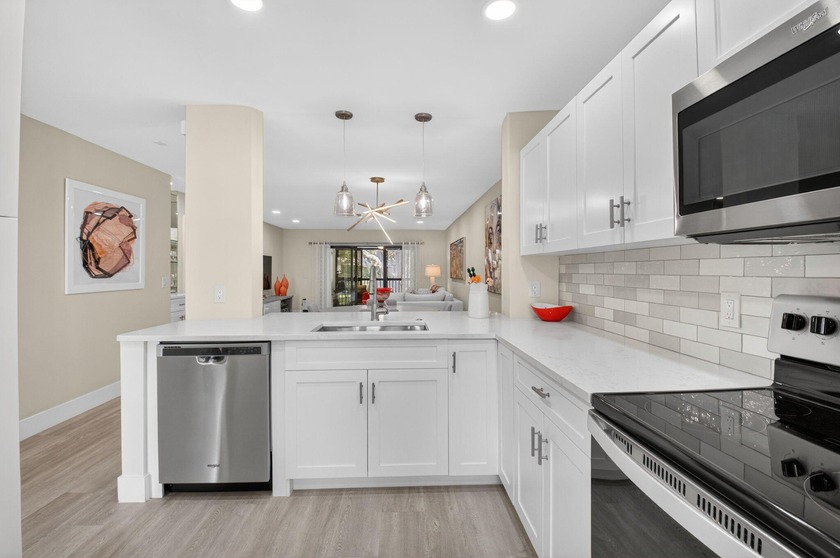 Experience refined country club living in this exquisitely - Beach Condo for sale in Boynton Beach, Florida on Beachhouse.com