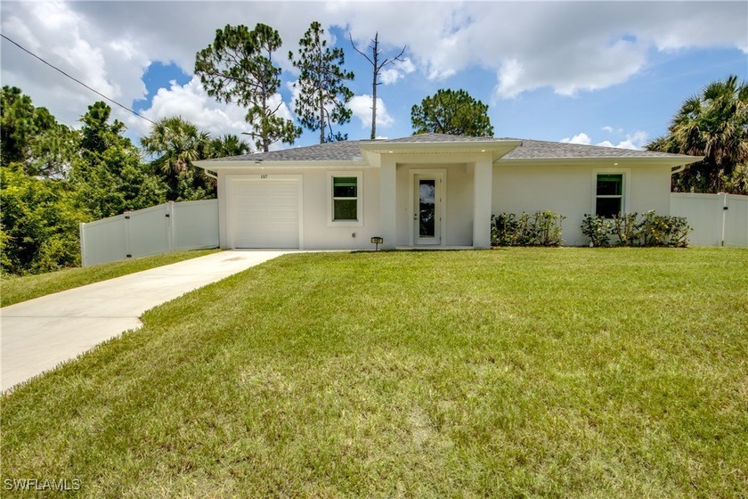 Seller offering $5,000 in incentives! Built in 2021, this - Beach Home for sale in Lehigh Acres, Florida on Beachhouse.com