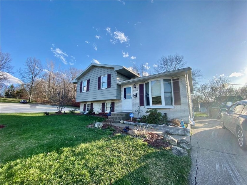 Move right in to this updated 3 bedroom home with a fenced in - Beach Home for sale in Erie, Pennsylvania on Beachhouse.com