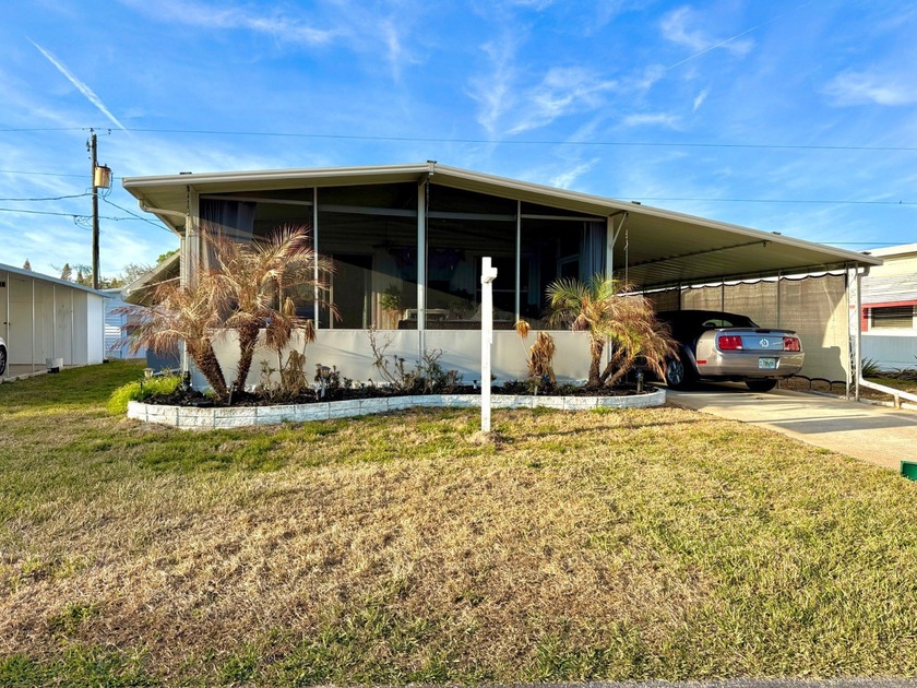 Welcome to this charming 2-bedroom, 2-bath 1974 mobile home - Beach Home for sale in Daytona Beach, Florida on Beachhouse.com