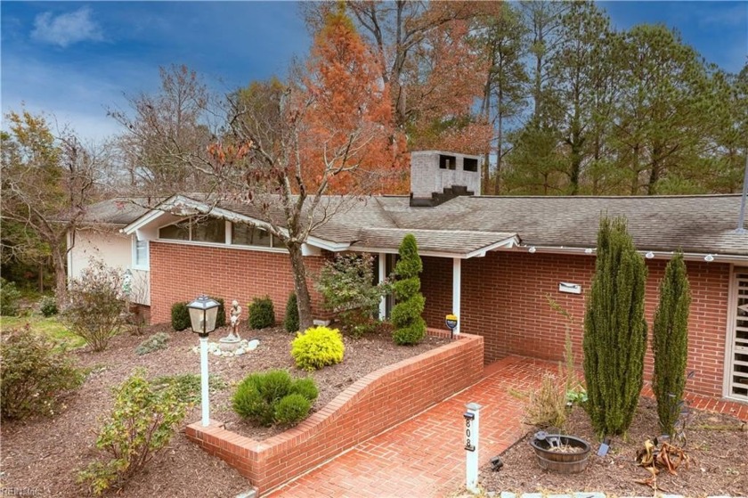 This mid-century modern home has a cool factor you must see in - Beach Home for sale in Suffolk, Virginia on Beachhouse.com