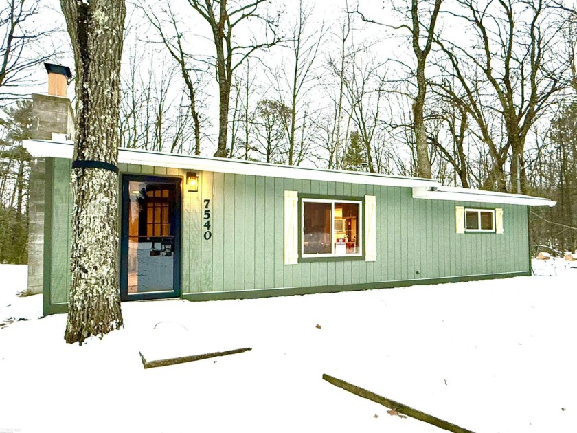 Charming Cabin nestled on a scenic ridge and surrounded by - Beach Home for sale in Oscoda, Michigan on Beachhouse.com