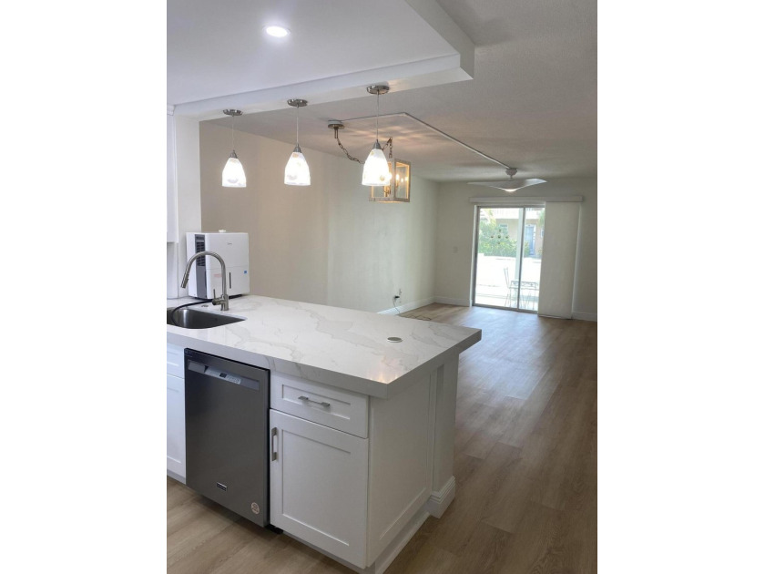 Fully renovated gorgeous white condominium East of I-95 and - Beach Condo for sale in Boynton Beach, Florida on Beachhouse.com