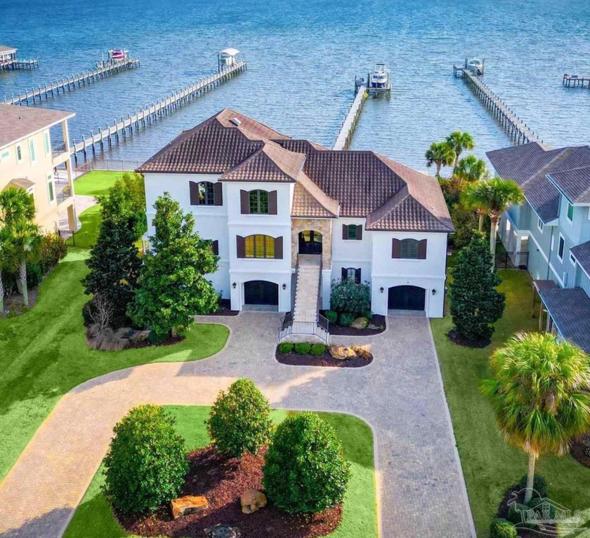 Luxury Waterfront Home located in Tiger Point with Dock, Pool - Beach Home for sale in Gulf Breeze, Florida on Beachhouse.com