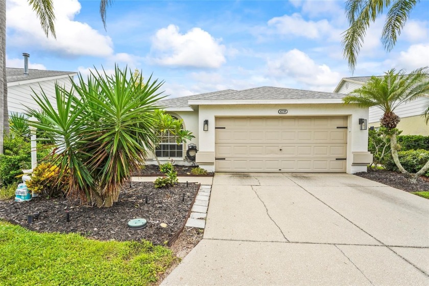 Set in the tranquil Treetops community, where low HOA fees - Beach Home for sale in Sarasota, Florida on Beachhouse.com