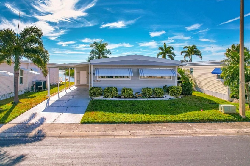 Welcome to this beautifully maintained waterfront home located - Beach Home for sale in Largo, Florida on Beachhouse.com