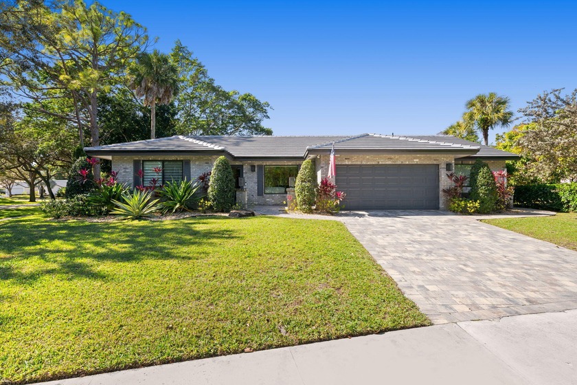 The wait is over! This home offers brand-new roof and new impact - Beach Home for sale in Boca Raton, Florida on Beachhouse.com