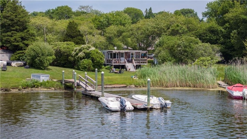 Step into the enchanting world of the Shi-Shi Shack, a magical - Beach Condo for sale in South Kingston, Rhode Island on Beachhouse.com